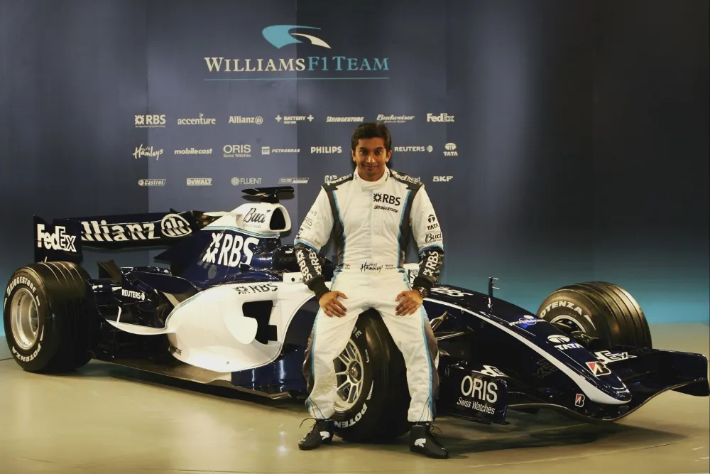 Narain Karthikeyan celebrating his 4th place finish at the 2005 US Grand Prix