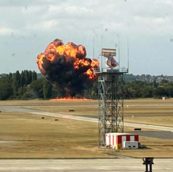 Black smoke plume rising from Southend Airport after Beechcraft plane crash on July 13, 2025.