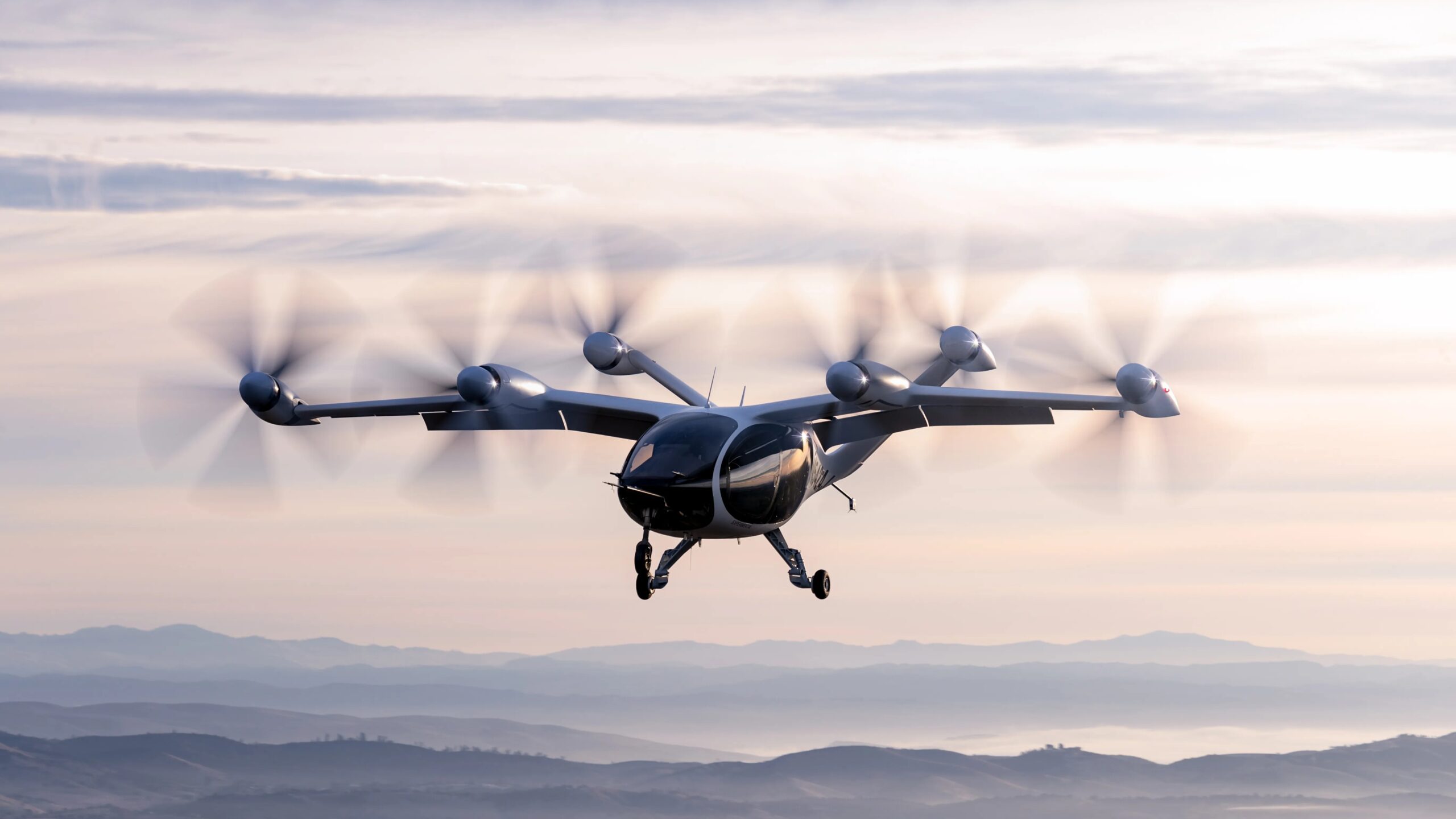Joby Aviation's all-electric eVTOL aircraft in flight, representing the future of air taxi services.